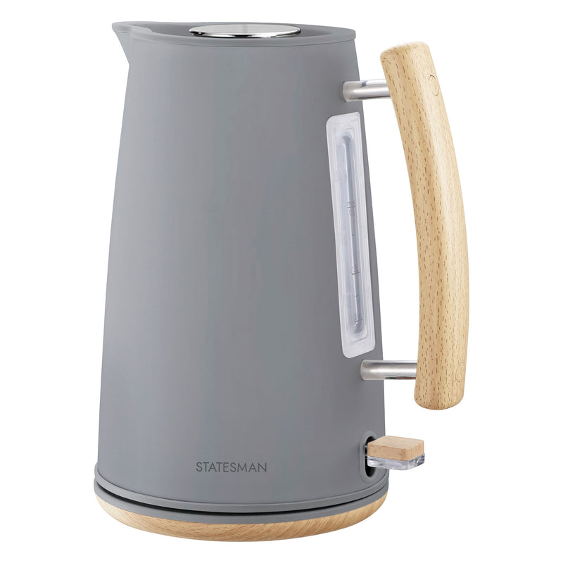 The Statesman Appliances Statesman 1.7L Scandi Kettle features a matte gray finish, light wood-effect handle and base, cordless design, water level indicator, silver lid, and 3000W power—stylishly presented against a white background.