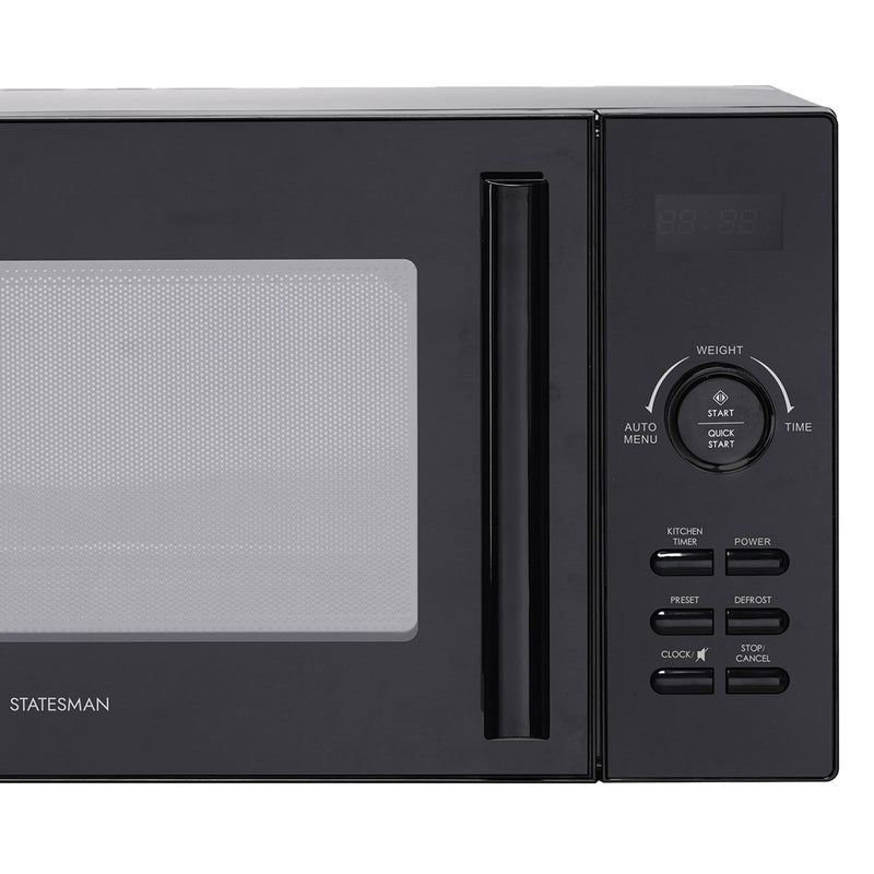 The Statesman Digital Microwave, 23 Litre 900W in black, features a glass door, vertical handle, digital display, and control panel with buttons for auto menu, power, preset, defrost, clock, stop/cancel and start/quick start.