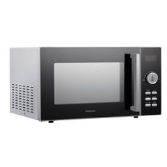 The Statesman Digital Microwave, 23 Litre 900W in silver features a modern design with a digital display, control buttons, and a right-side handle, shown from a slight angle.