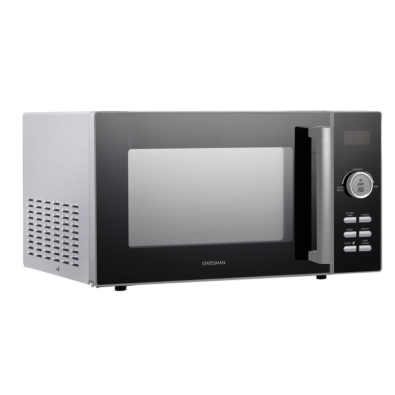 The Statesman Digital Microwave, 23 Litre 900W in silver features a modern design with a digital display, control buttons, and a right-side handle, shown from a slight angle.