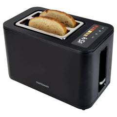 A Statesman Appliances 900W 2 Slice Digital Toaster in black holds two slices of bread. It features wide slots, a digital display, and top touch buttons showing toasting progress. The brand is visible on the side.